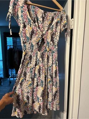 Free People miss right floral dress front  key hole sz L